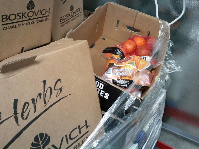 Different boxes with produce in them.